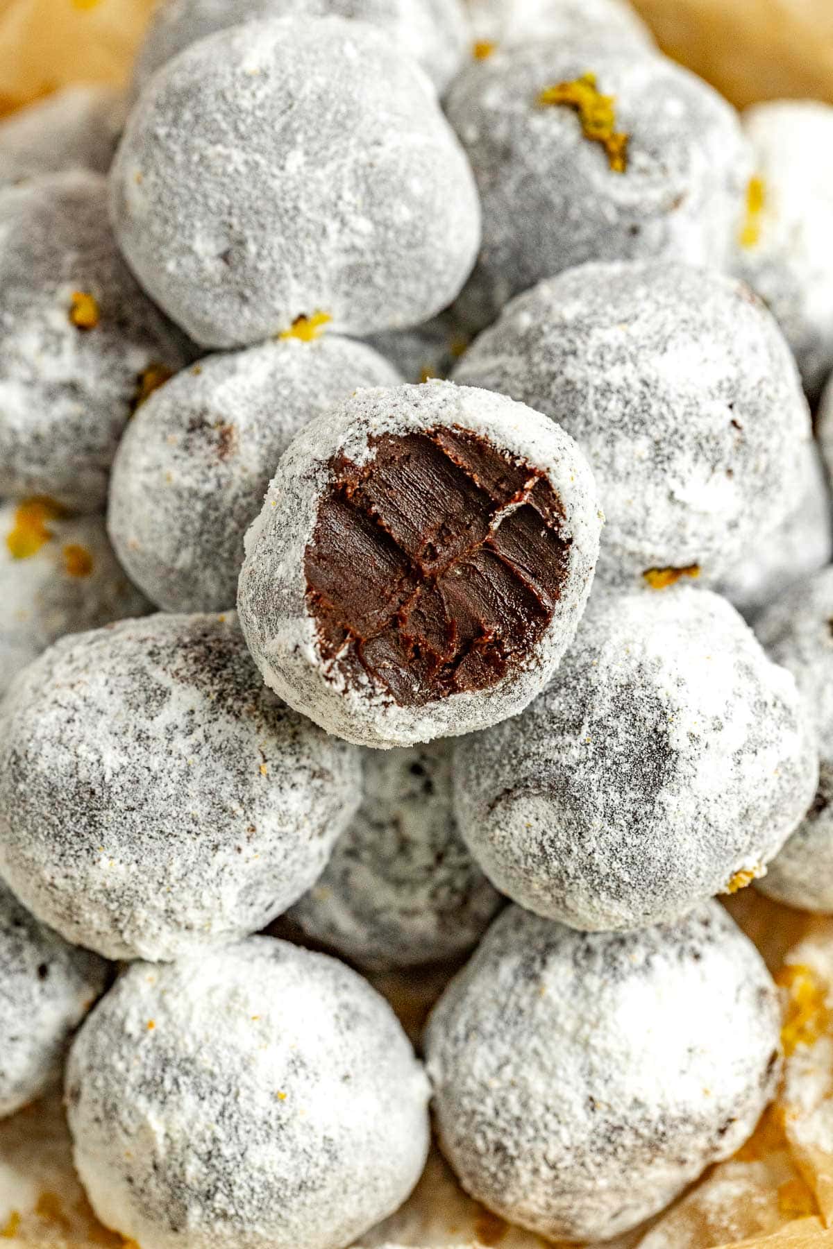 Chocolate Orange Truffles in serving bowl with bite taken