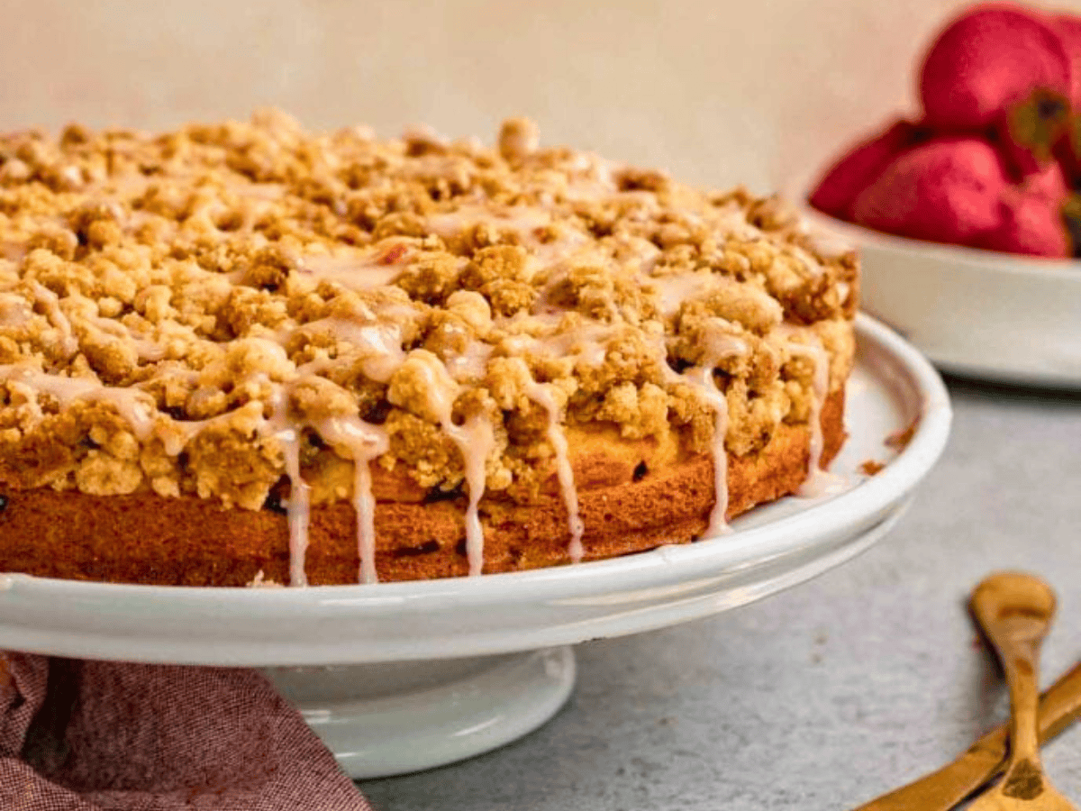 Cake on stand with drizzle