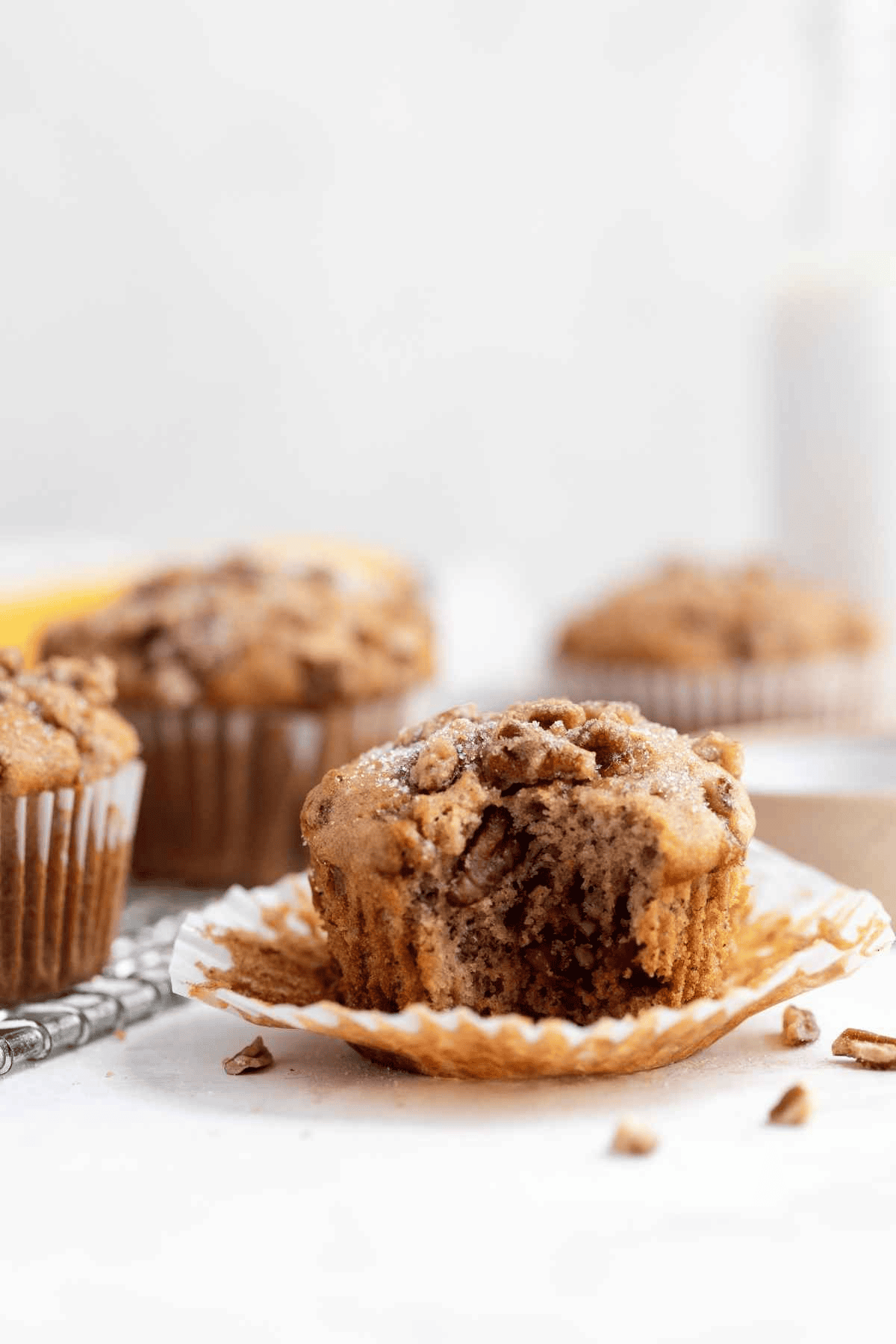 Unwrapped muffin with a bite taken out