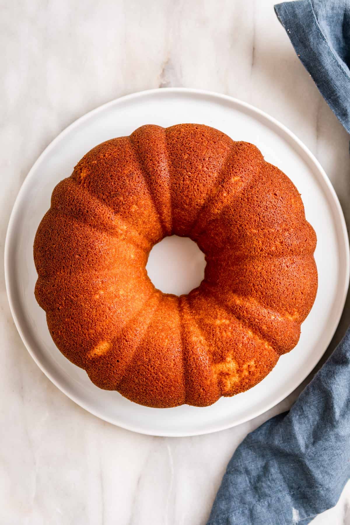 7up Pound Cake baked on plate with no glaze