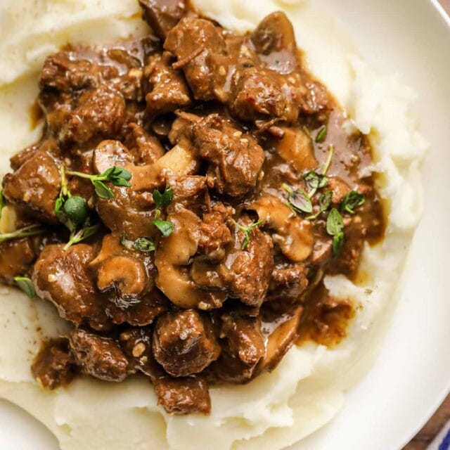 Beef Tips with Mushroom Gravy on serving plate 1x1