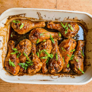 marinated cooked poultry cooked on a dish with garnish