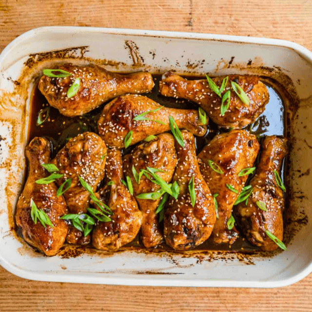 marinated cooked poultry cooked on a dish with garnish