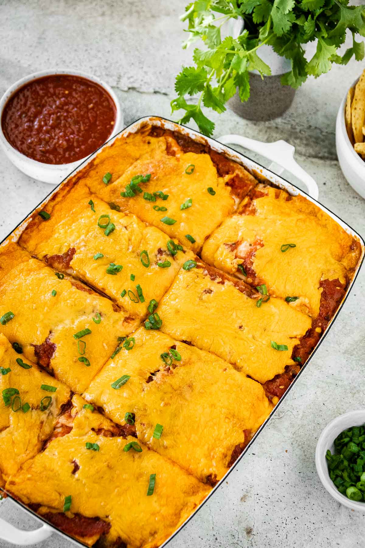 Cheesy Taco Lasagna baked sliced in dish