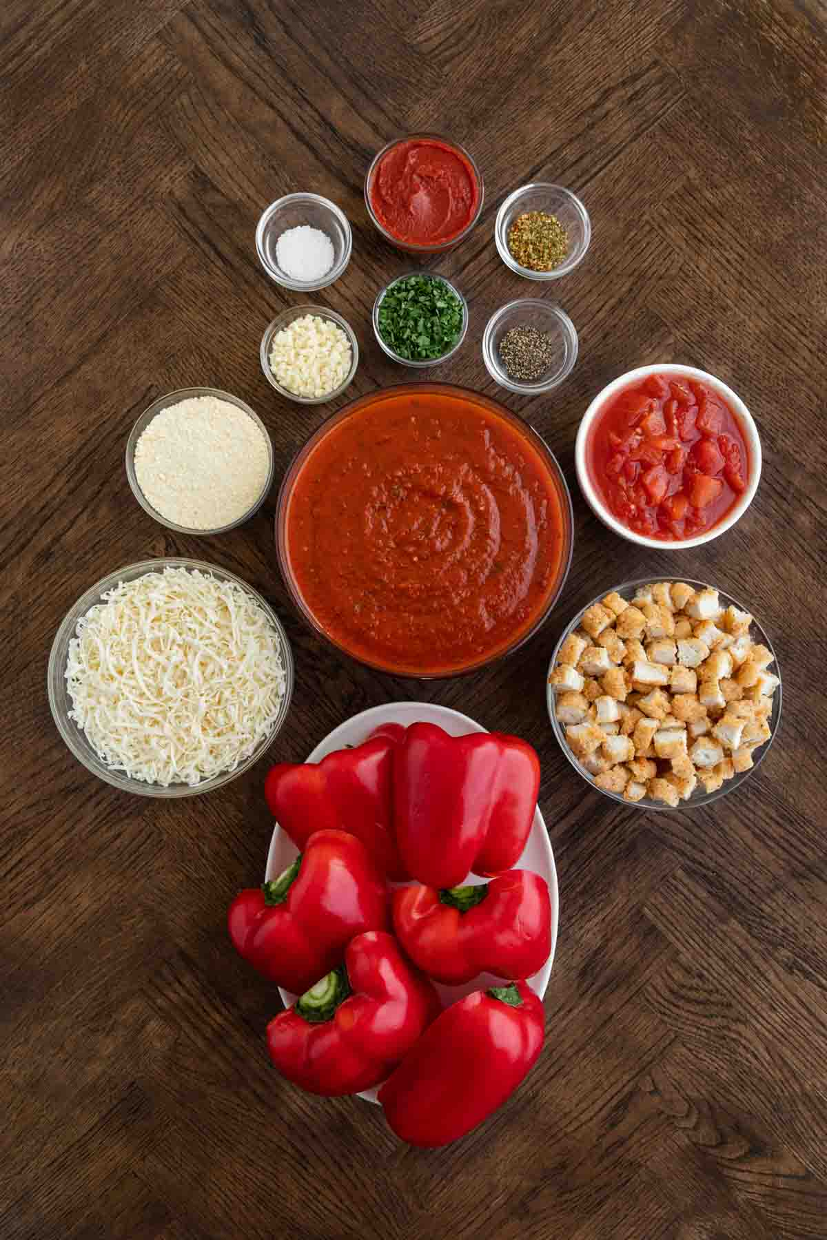 Chicken Parmesan Stuffed Peppers ingredients in separate prep bowls