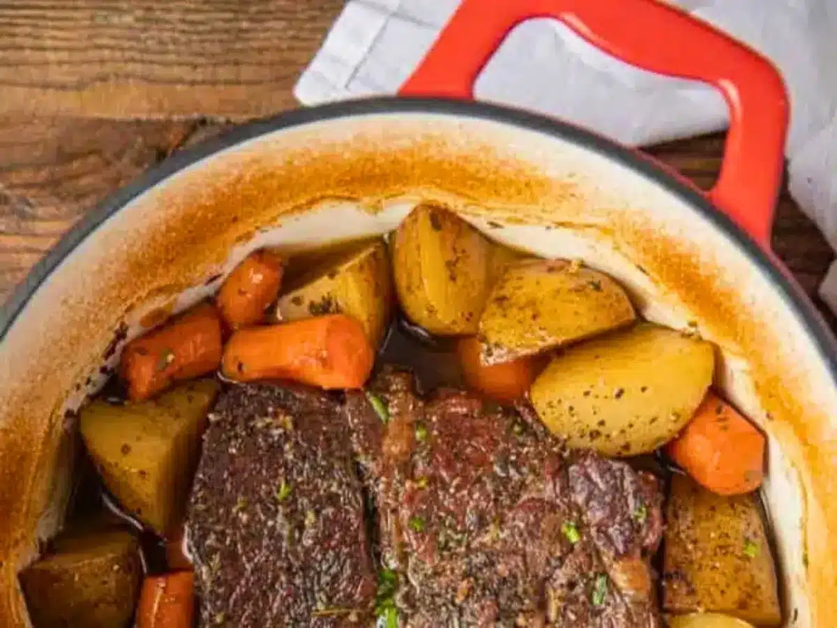 beef, potatoes, and carrots in a dutch oven