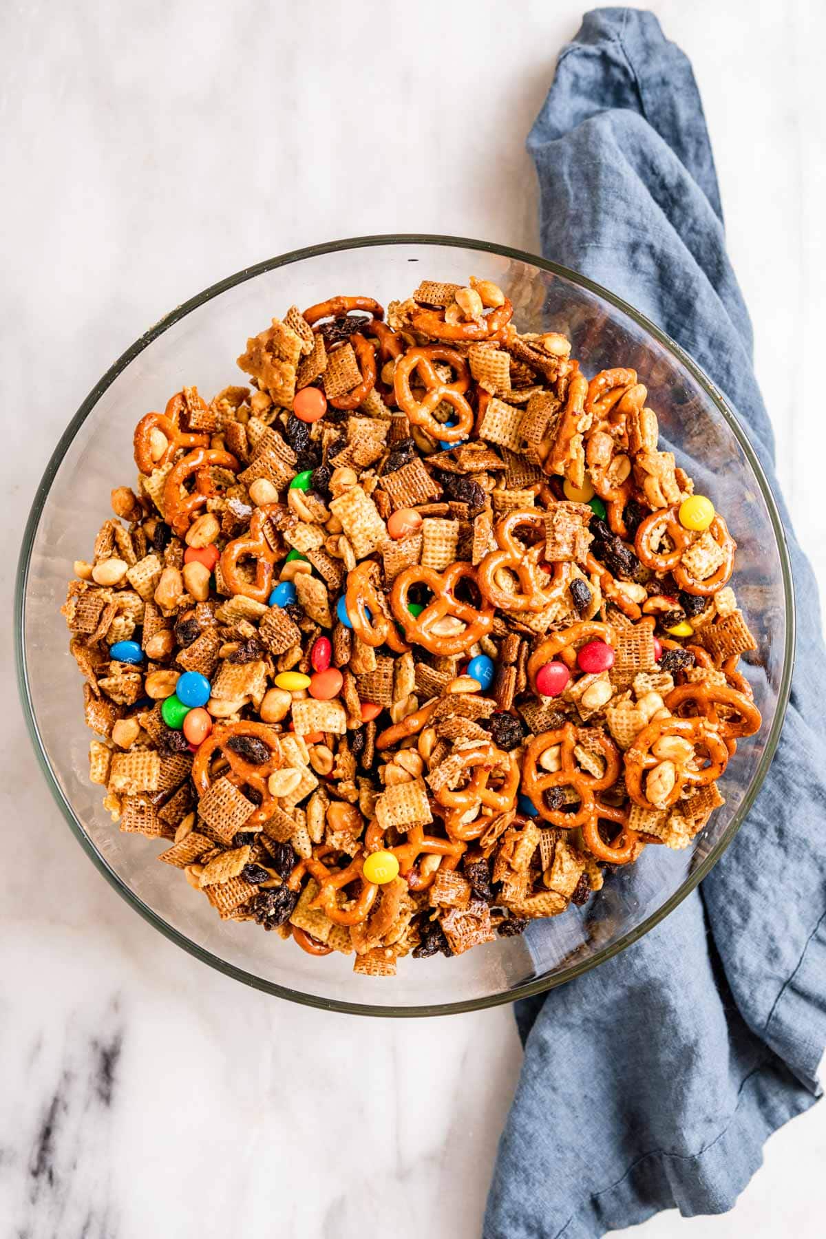 Sweet and Salty Snack Mix with all ingredients in mixing bowl