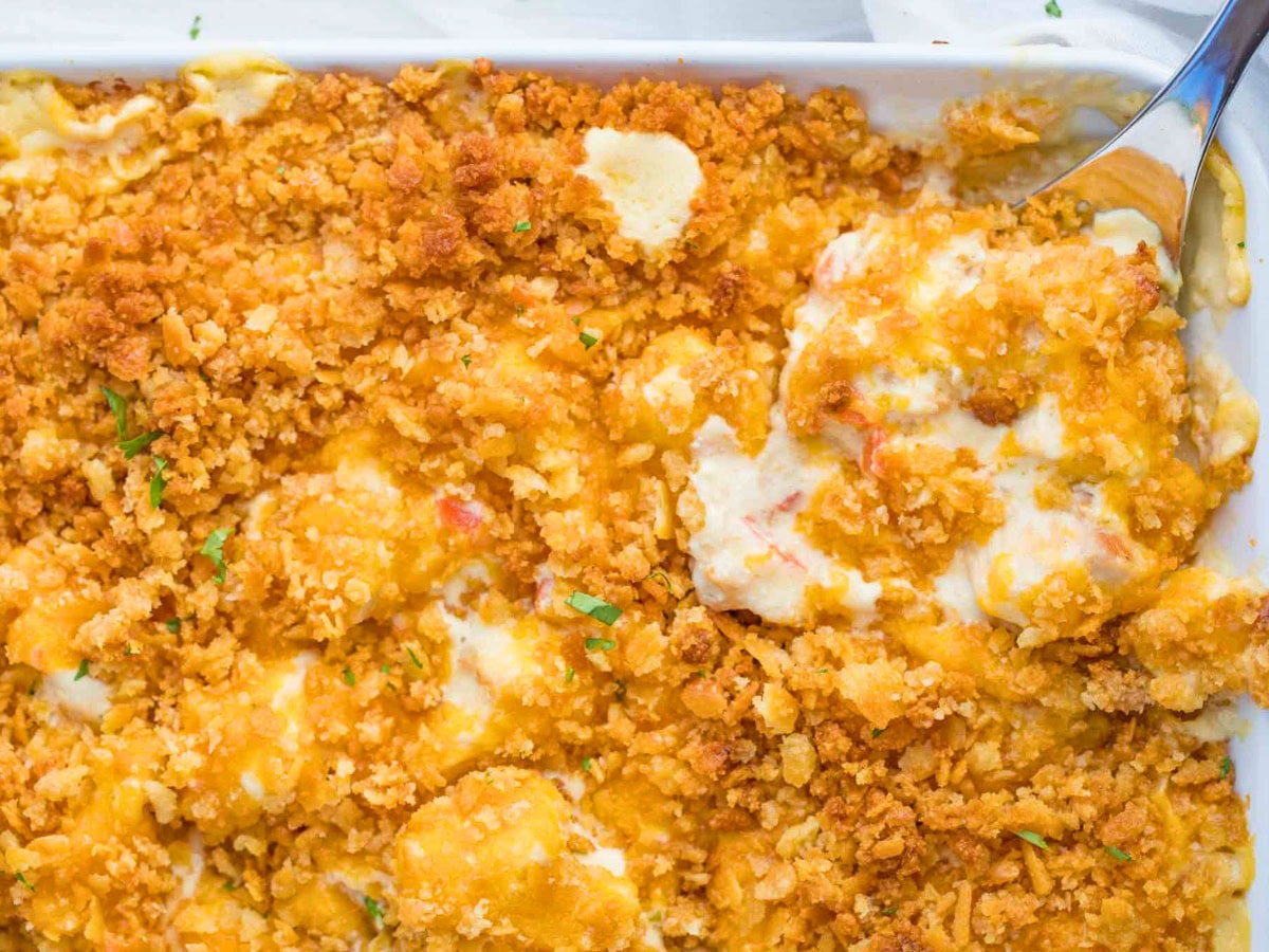 Finished casserole with a serving spoon