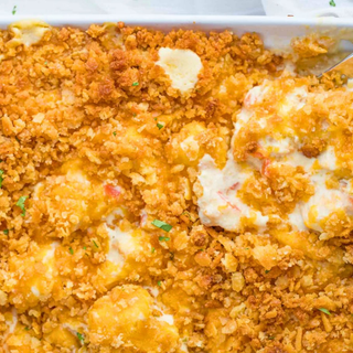 Baking dish of cramy chicken and a crunchy topping casserole