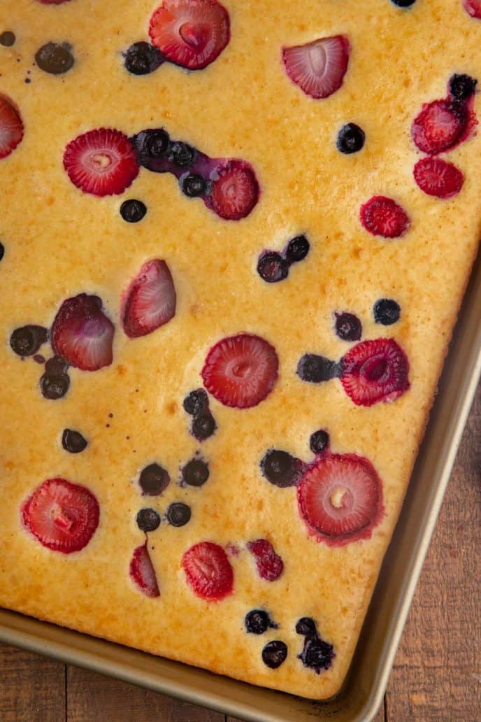 Close up of pancake with strawberry and blueberries