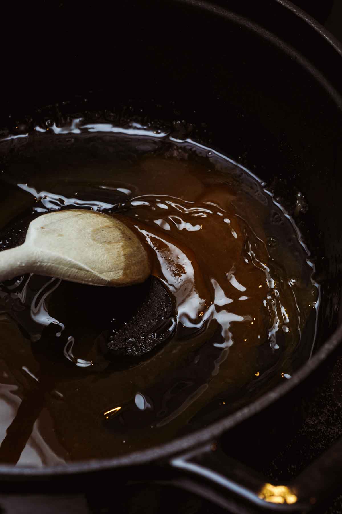 Onion Jam caramelized sugar stirred in cast iron pot
