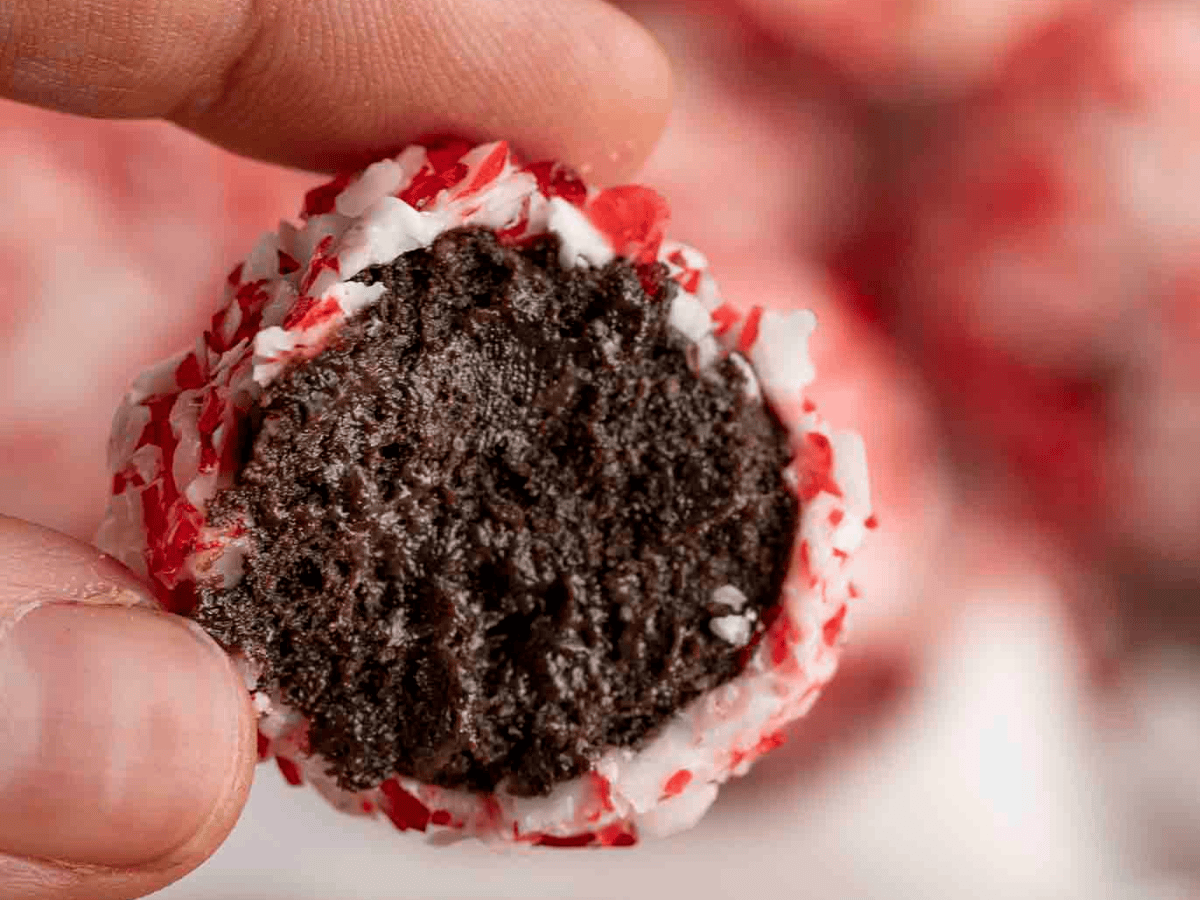 Closeup of bite taken out of dessert cookie ball