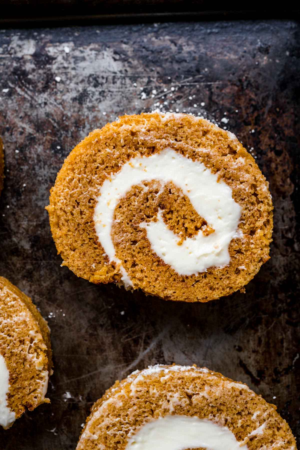 Pumpkin Roll slices on cutting board