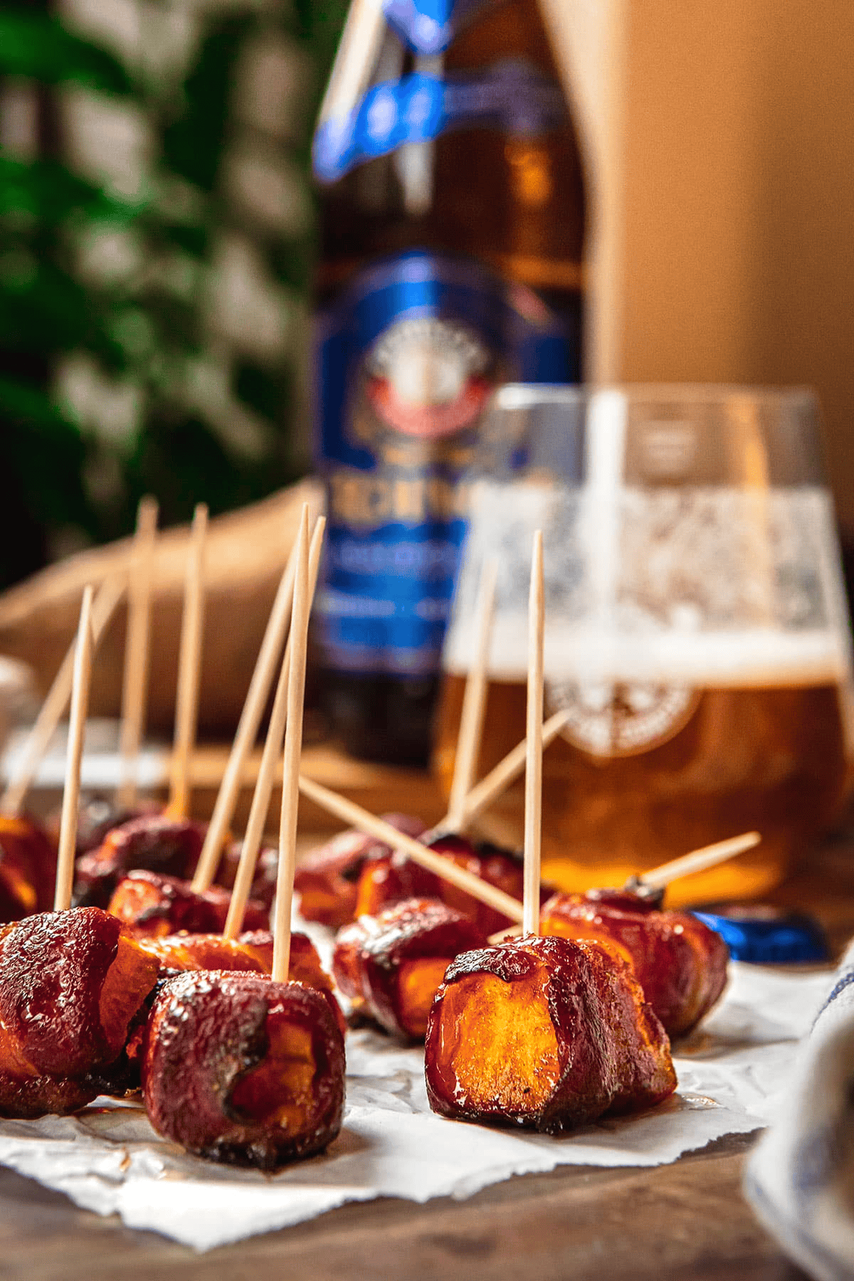 Sweet potatoes wrapped in bacon with toothpicks
