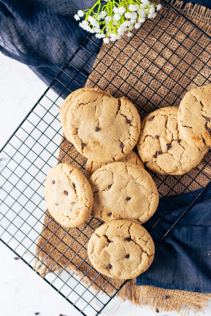 Cheesecake Stuffed Chocolate Chip Cookies baked on wire cooling rack