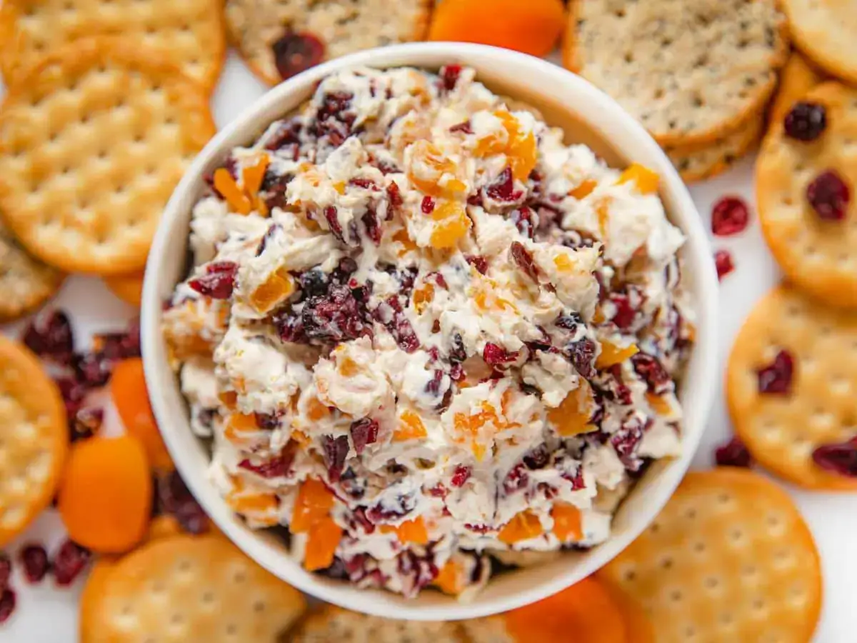 Cheese spread on plate of crackers
