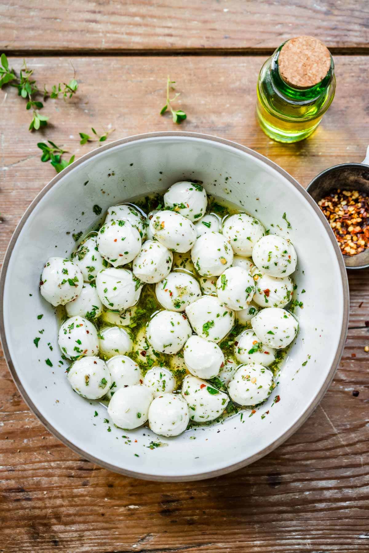 Marinated Mozzarella Balls ingredients in mixing bowl