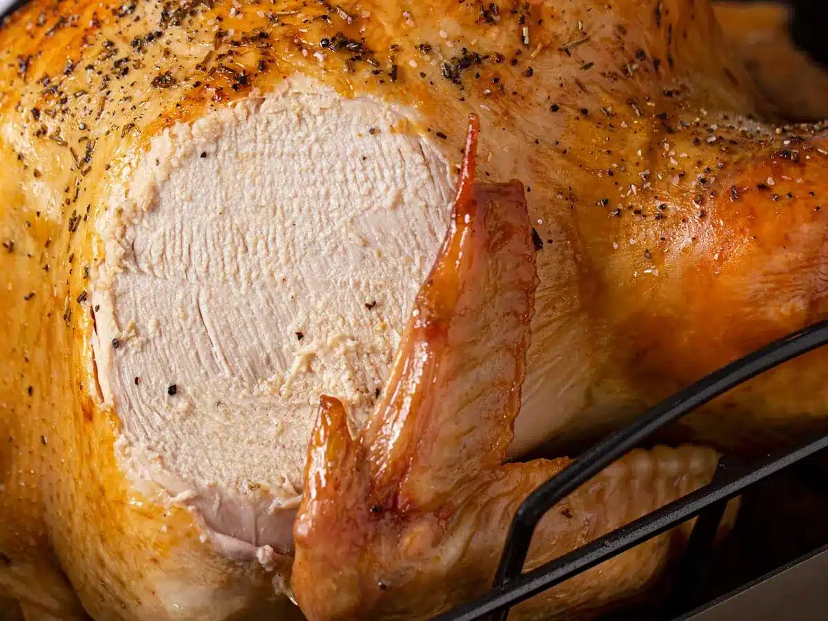 Cooked meat with slice cut out