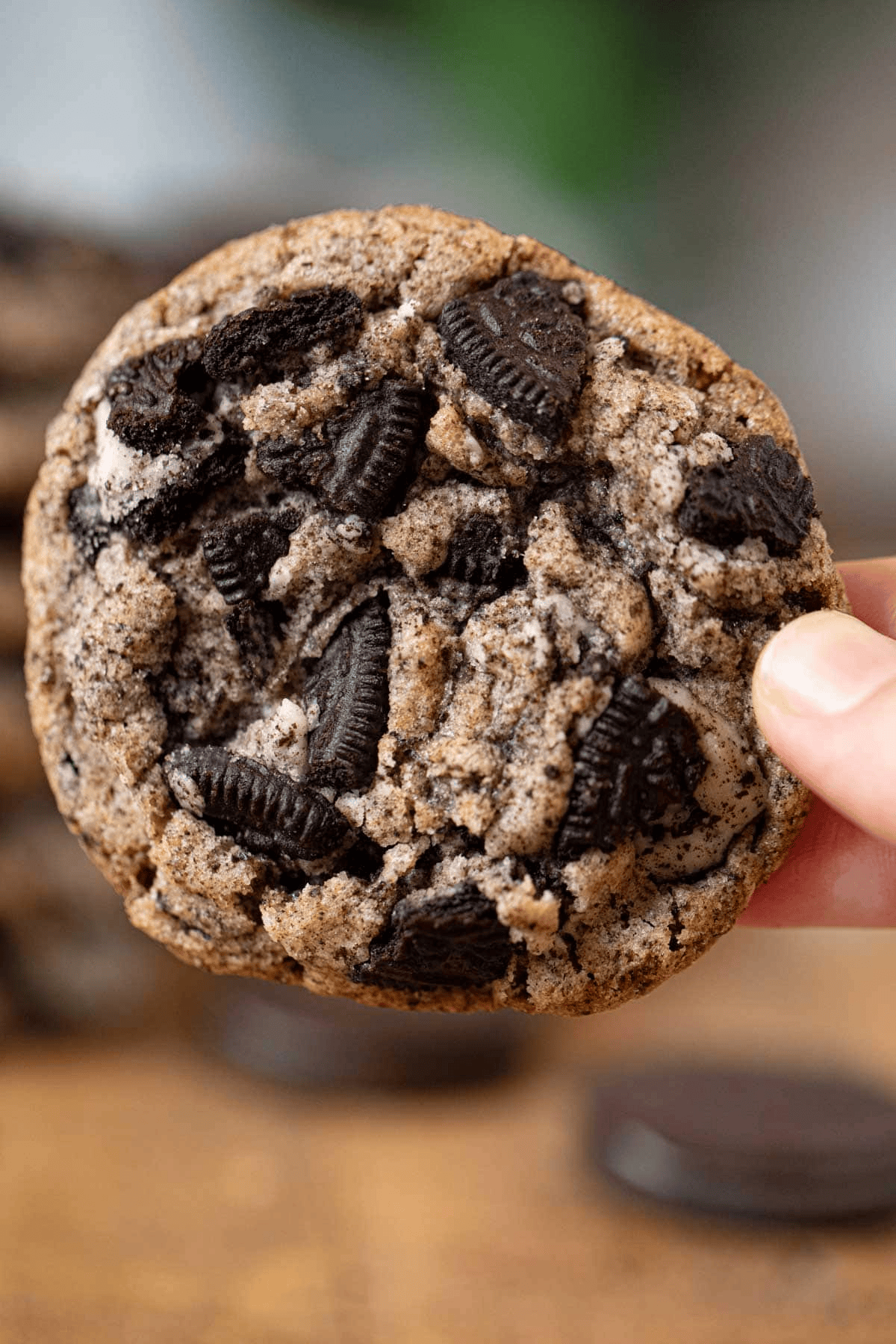 Holding cookie with Oreo chunks