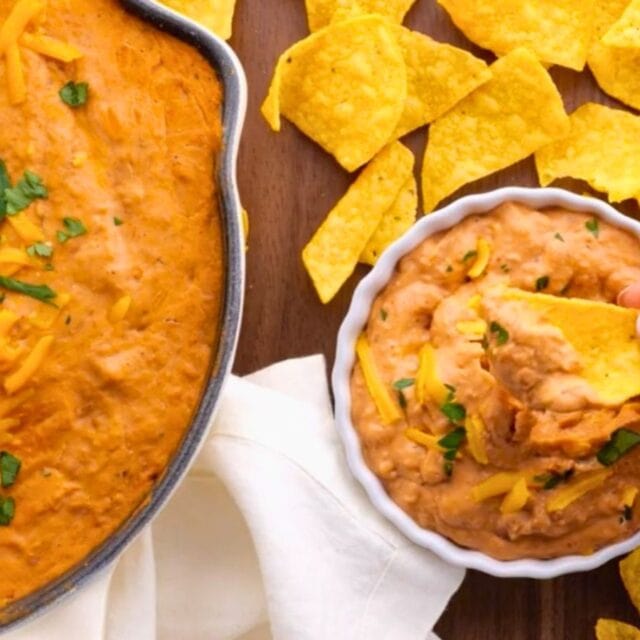 Pan and bowl of beans with chips