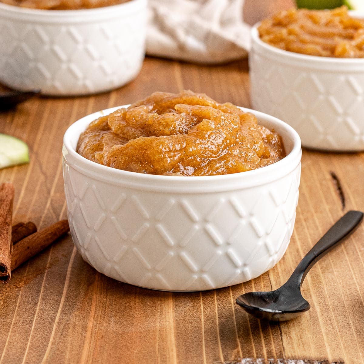Baked Applesauce in White Bowl with Spoon