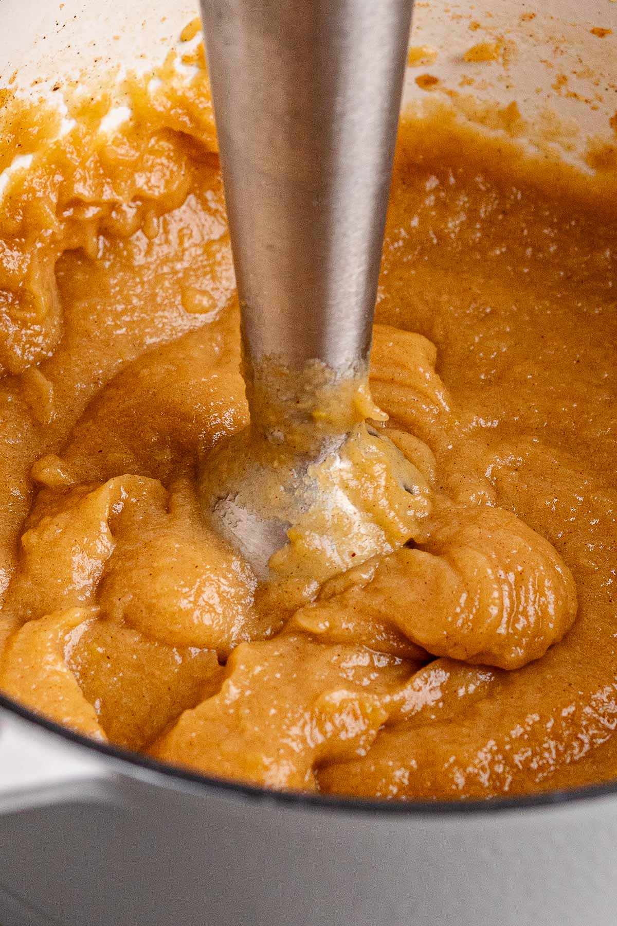 Baked Applesauce in pan being blending