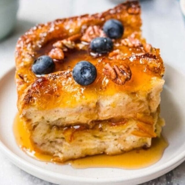 serving of French toast on plate with syrup