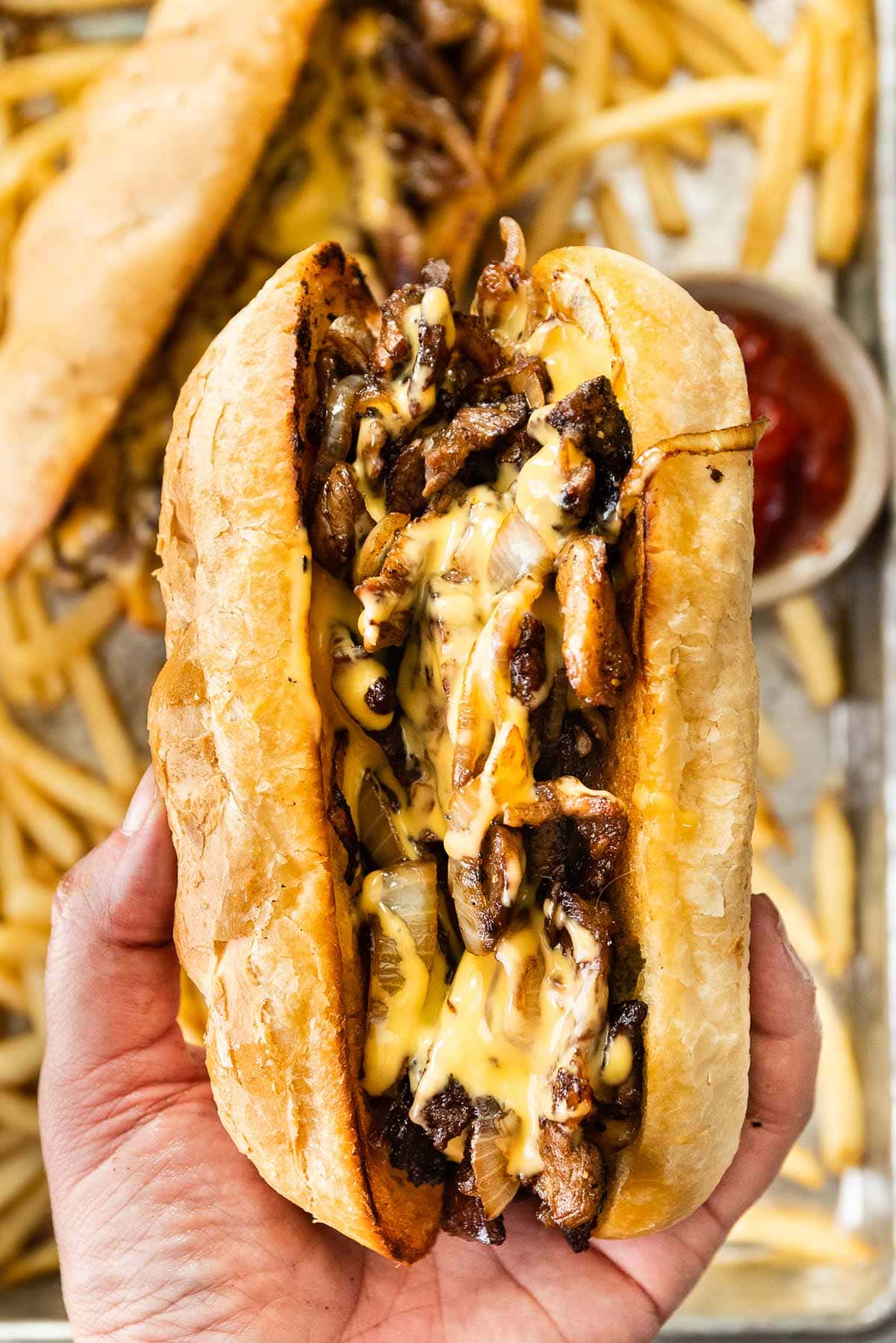 Philly Cheesesteak in hand