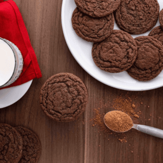 plate of cookies with milk on side