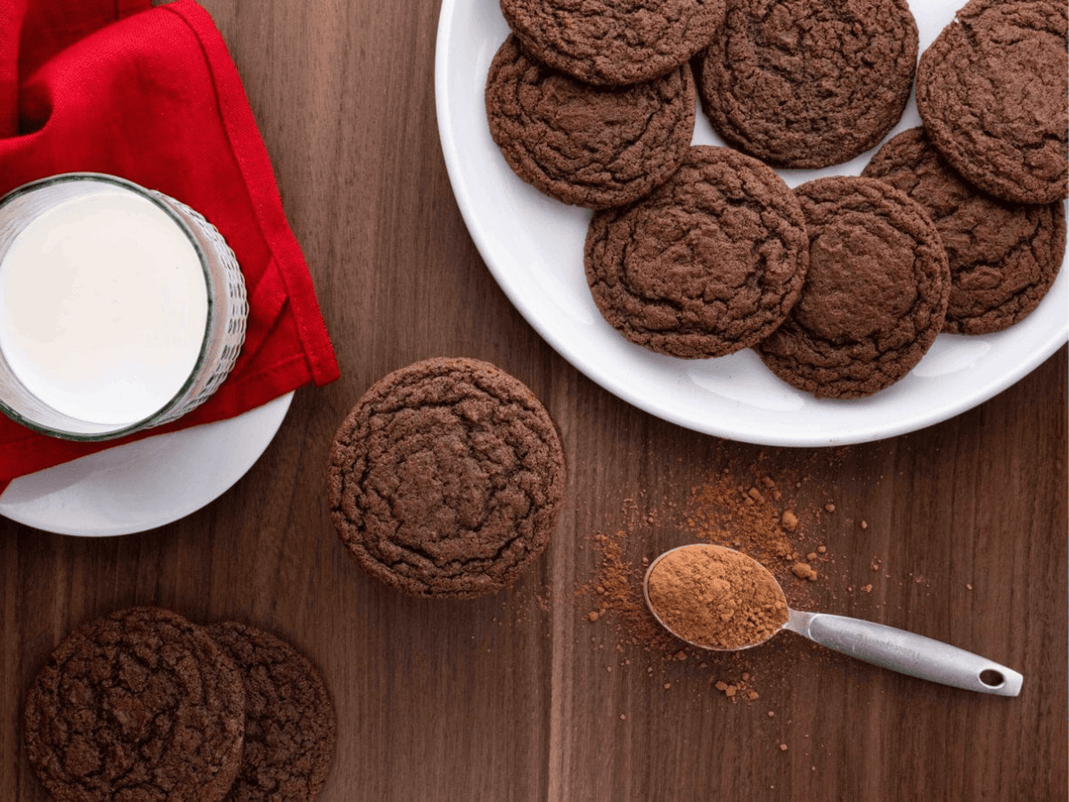 plate of cookies with milk on side