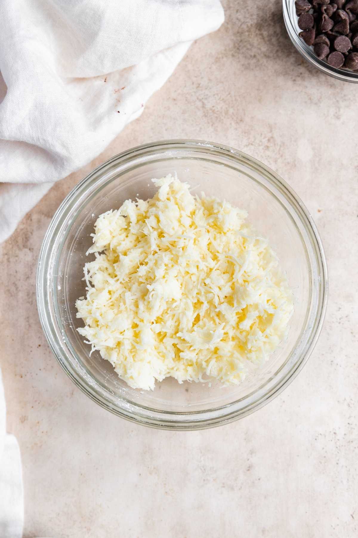 Coconut Joy Candies shredded coconut in large glass bowl