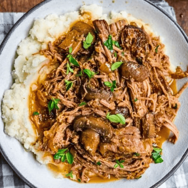 Shredded Beef over mashed potatoes