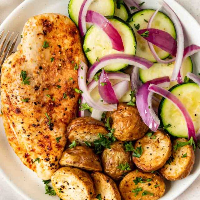 Overhead view of Chicken Breasts unsliced on plate