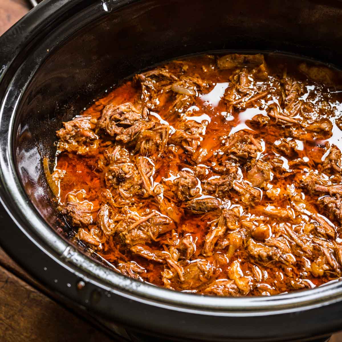 The Best Slow Cooker Shredded Beef Recipe - NeighborFood