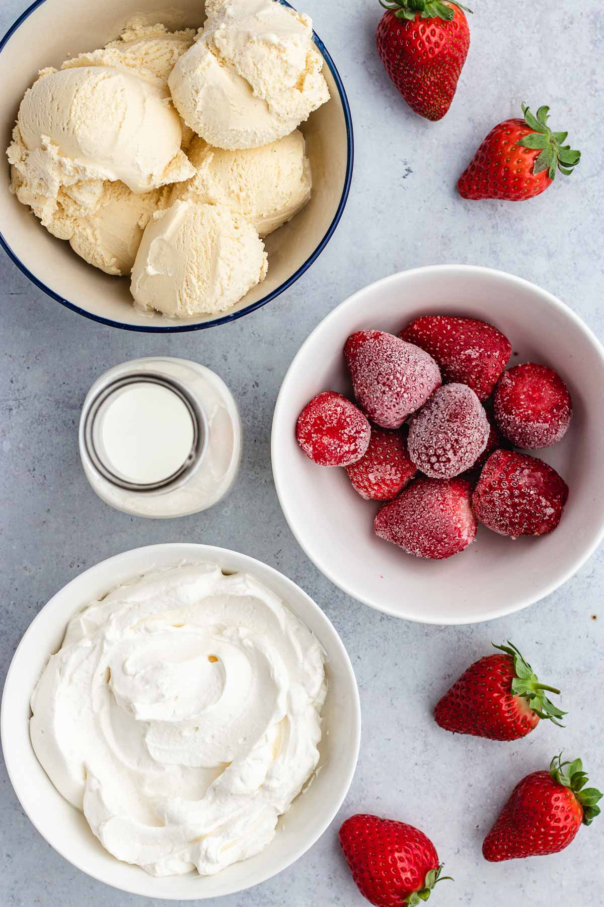 Strawberry Milkshake ingredients in bowls