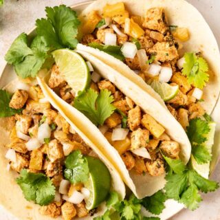 Pork served in tortillas with garnish