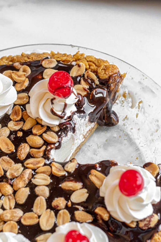 Tin Roof Sundae Pie with a slice cut out