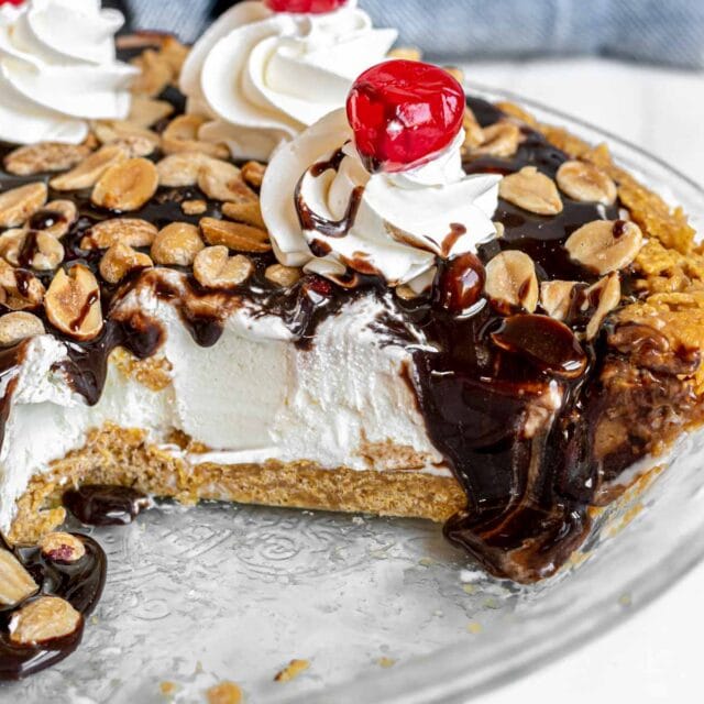 Tin Roof Sundae Pie with a slice cut out