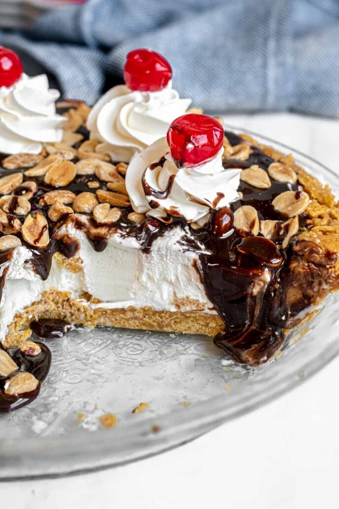 Tin Roof Sundae Pie with a slice cut out