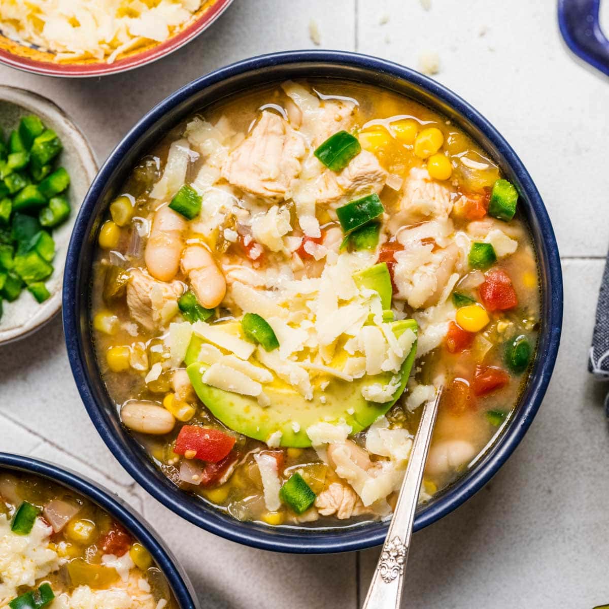 White Bean Chicken Chili served in bowl with garnish