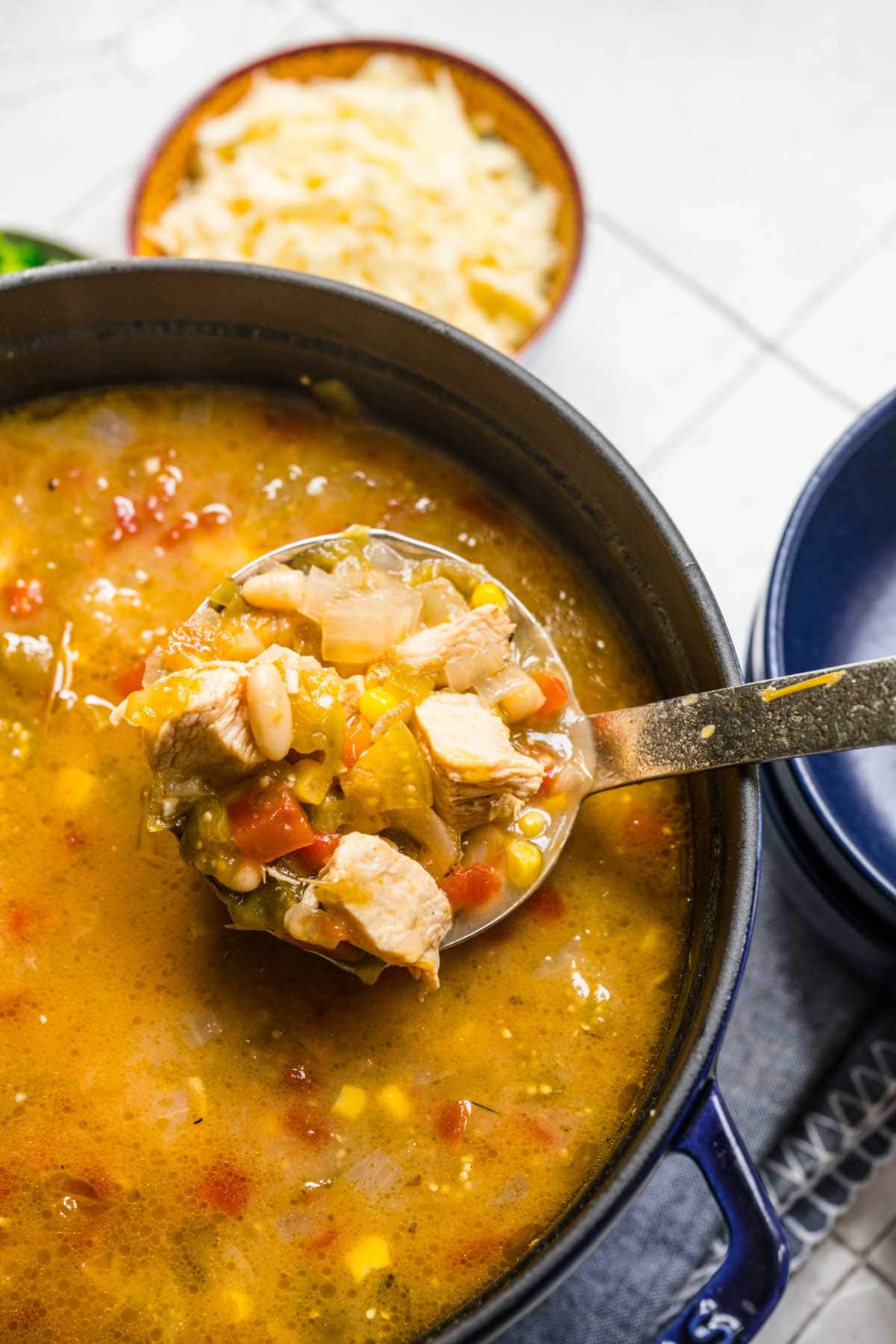 White Bean Chicken Chili prepared in ladle and pan