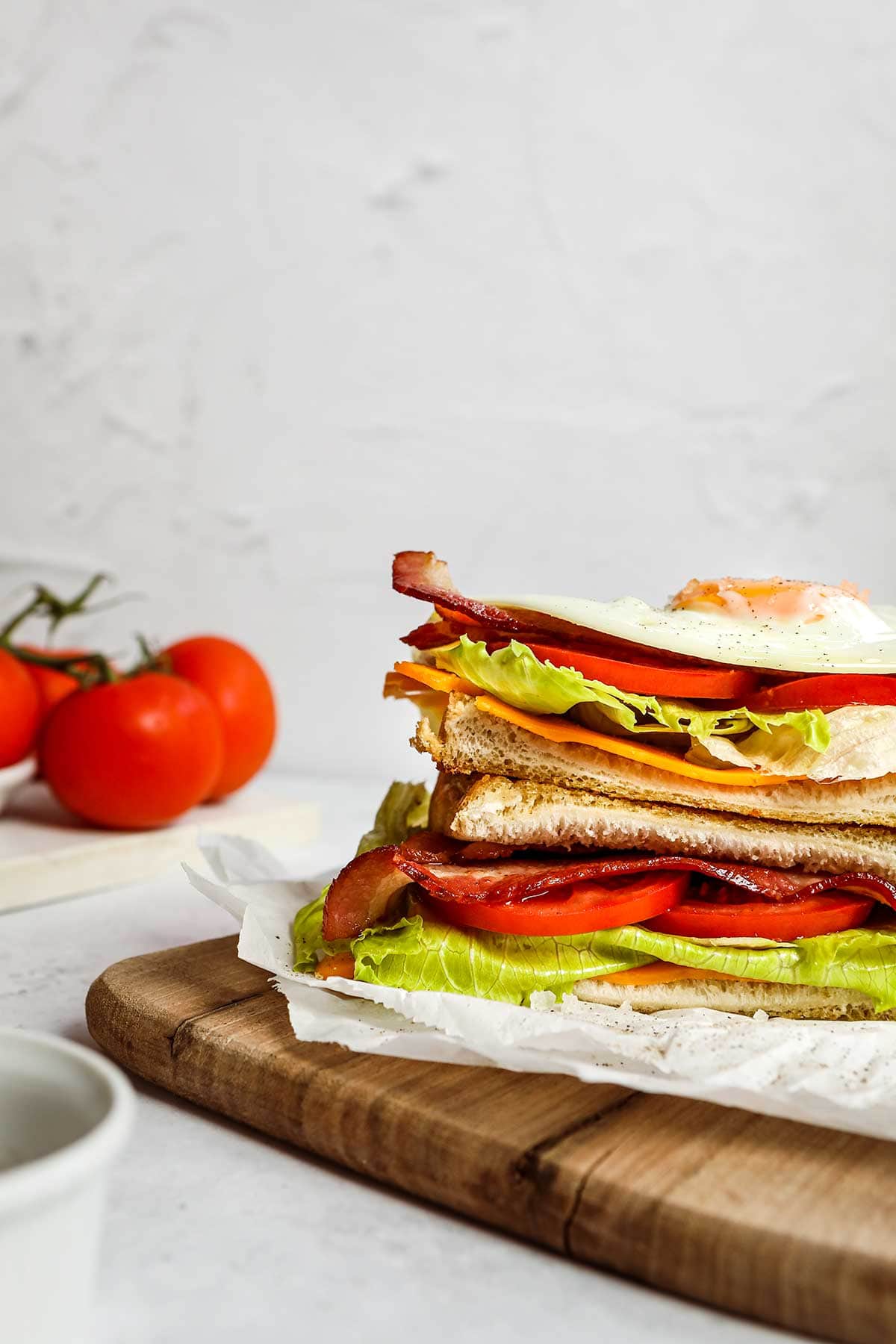 Breakfast Sandwich cut on cutting board