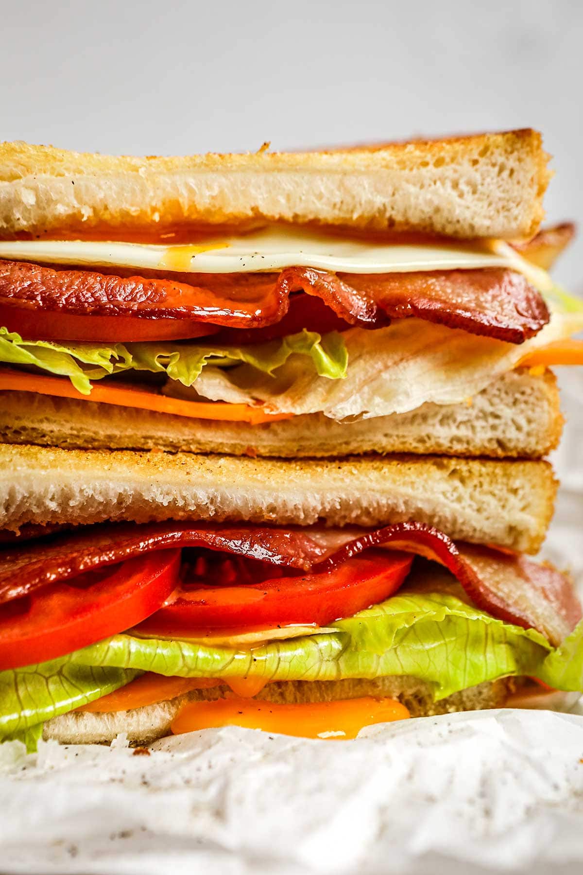 Breakfast Sandwich cut on cutting board