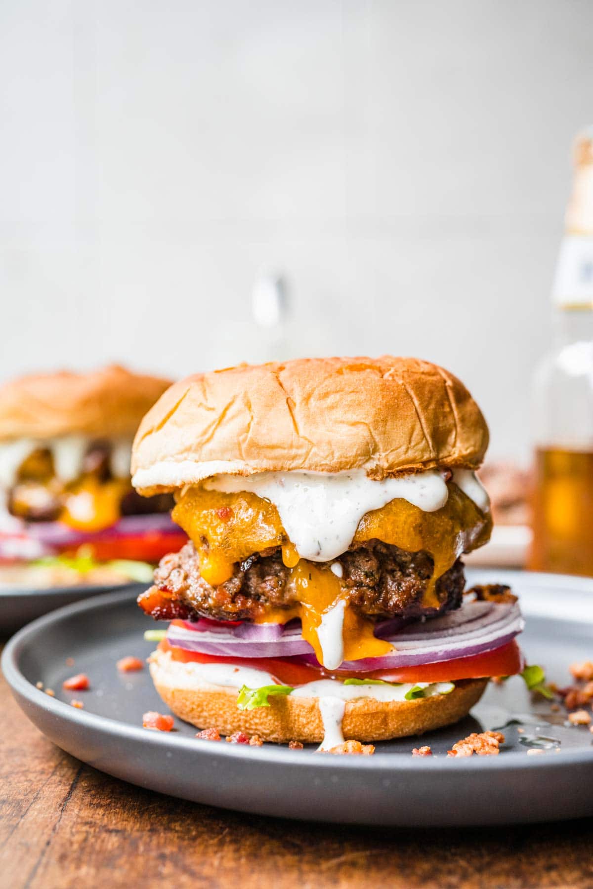 Cheddar Bacon Ranch Cheeseburgers on serving plate
