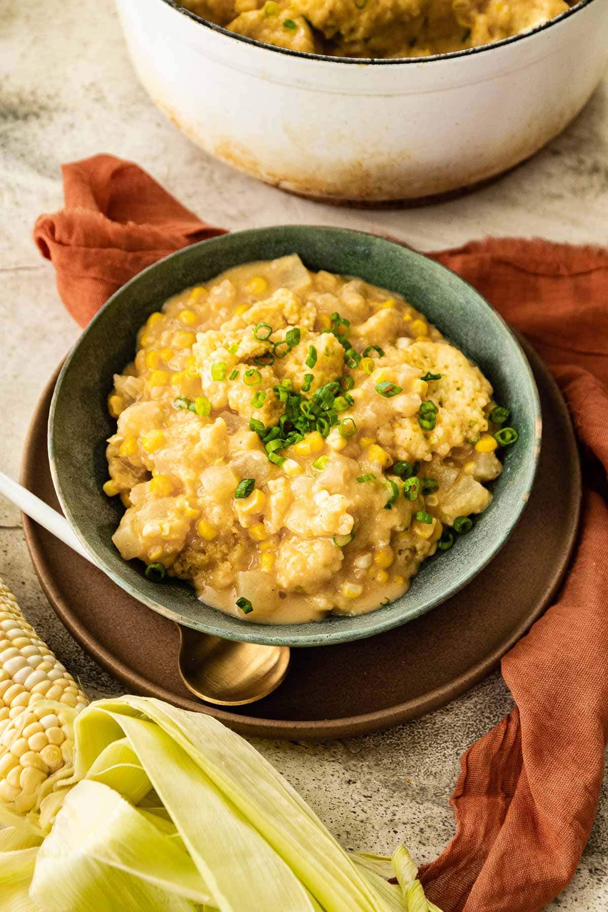 Corn Chowder with Cornmeal Dumplings in serving bowl