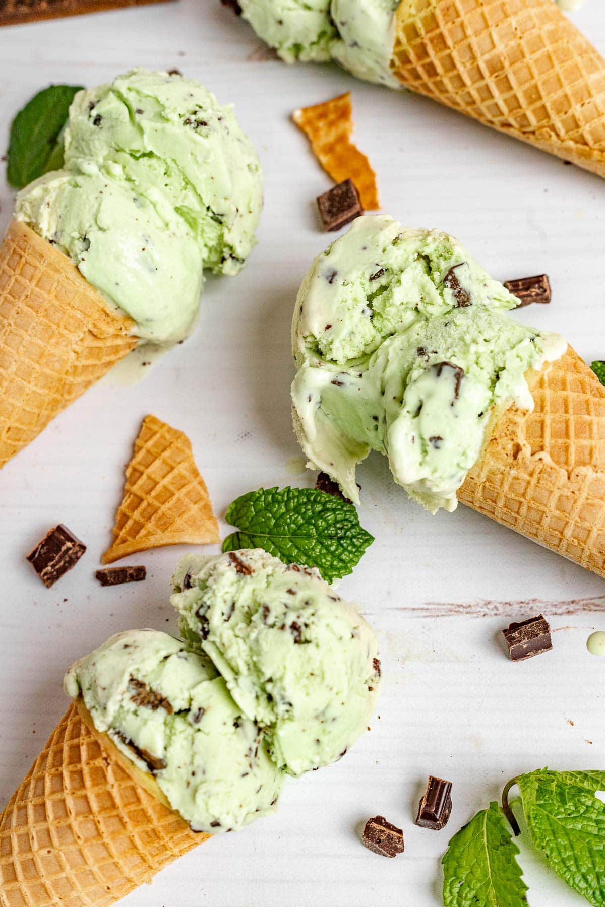 Mint Chocolate Chip Ice Cream three scoops in three cones