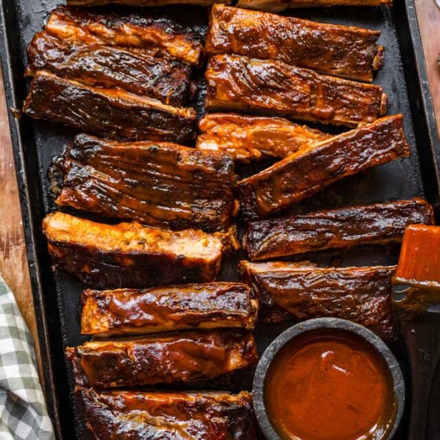 Ultimate Oven Barbecue Ribs on serving trayUltimate Oven Barbecue Ribs on serving tray 16x9