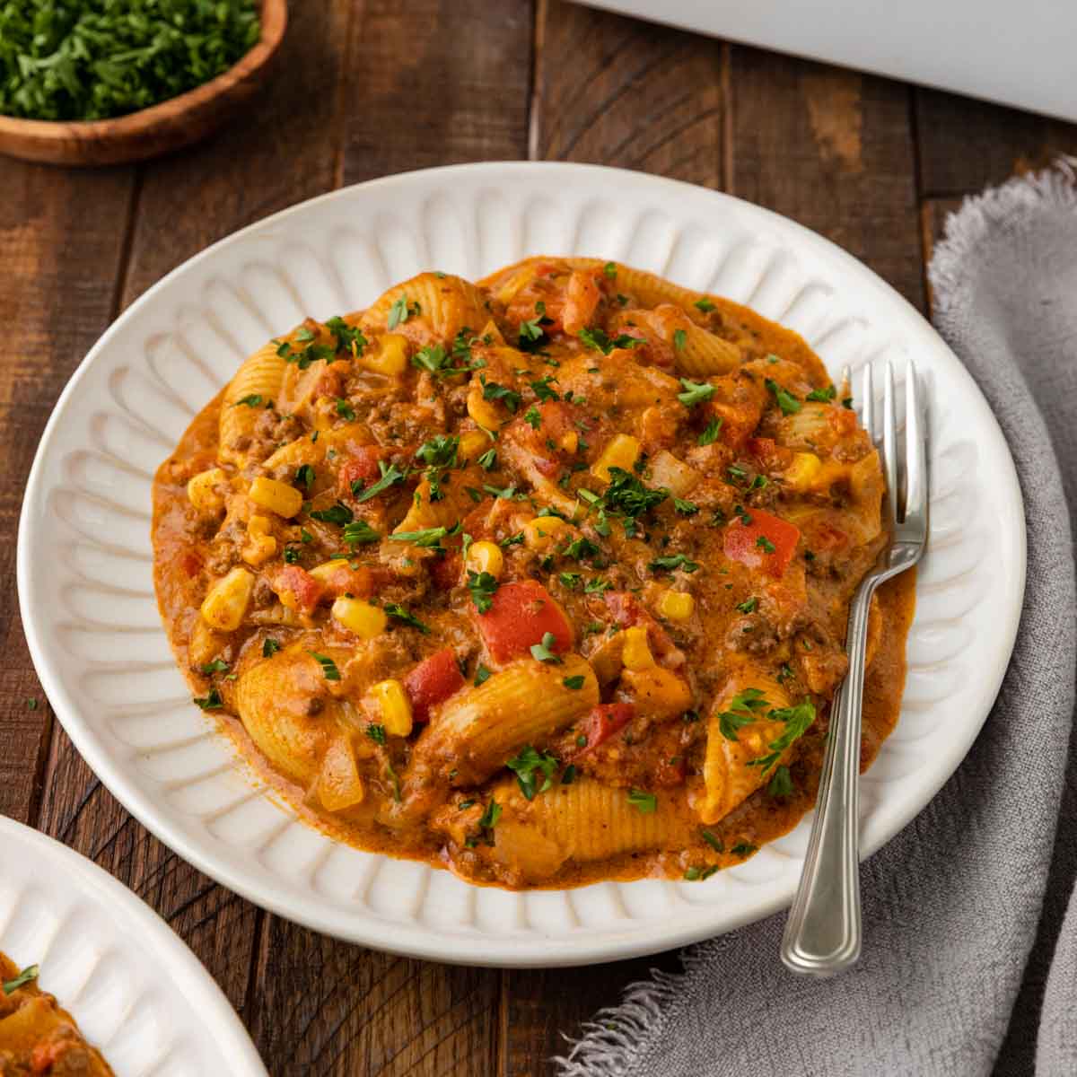 Tex Mex Cheesy Beef Pasta in bowl with fork