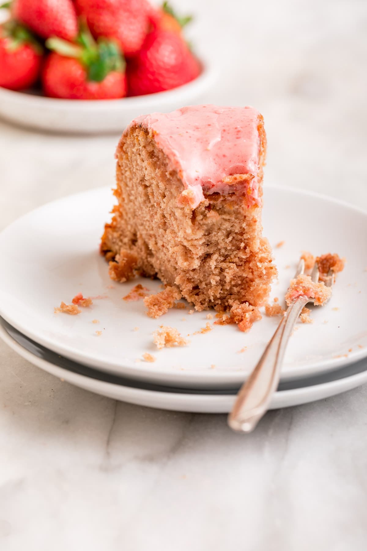 Strawberry Bundt Cake slice on serving plate