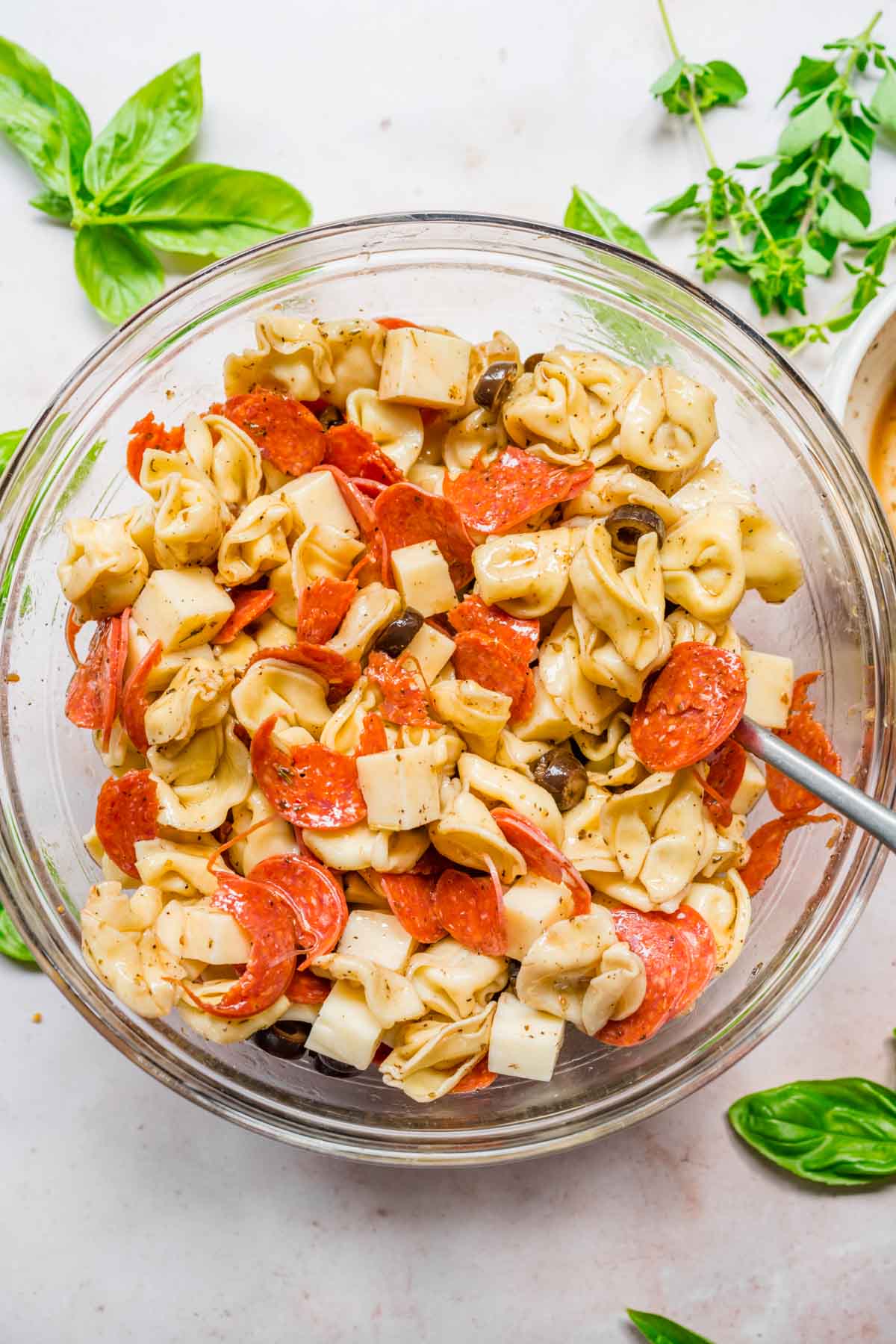 Tortellini Salad in mixing bowl